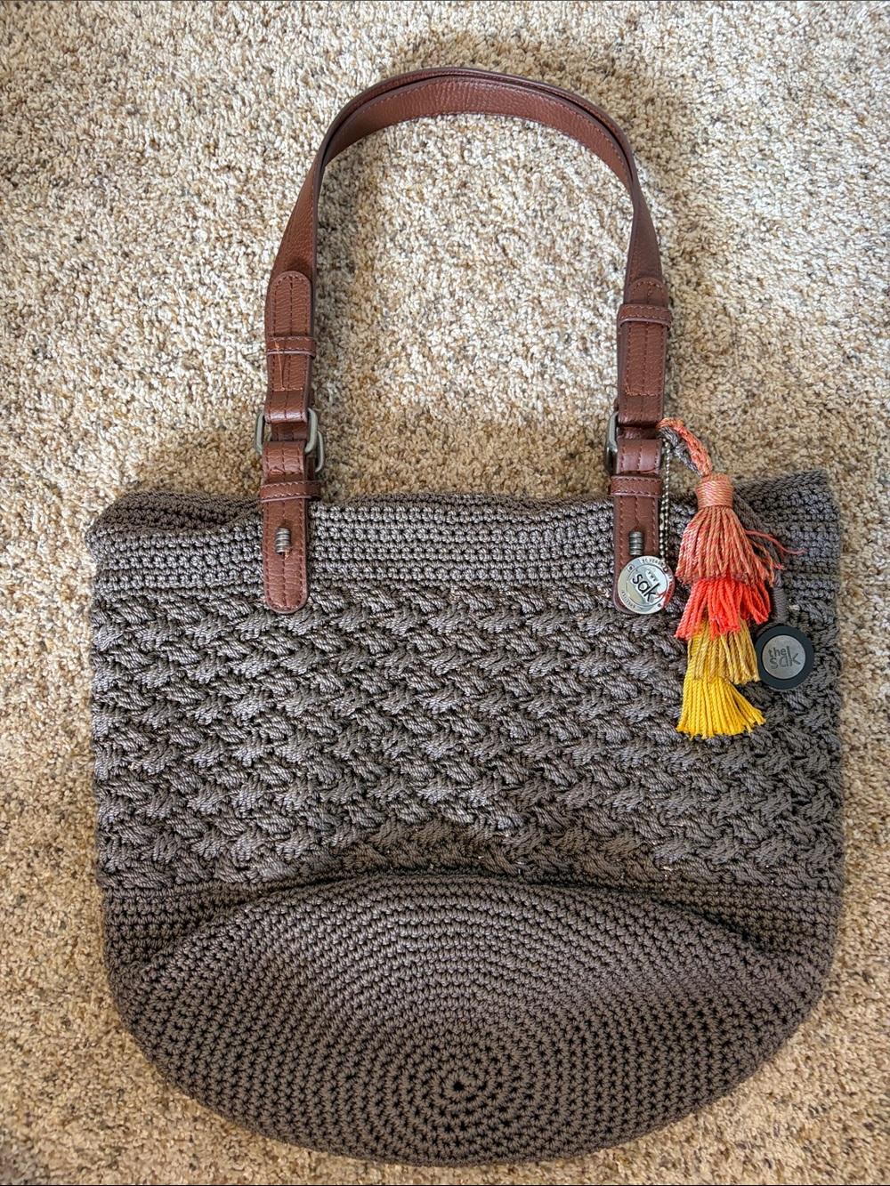 The Sak Crochet-Style Brown Tote with Multicolor Tassel Accent